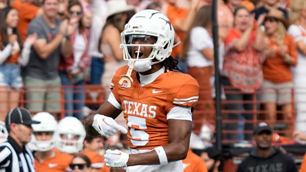 Texas Longhorns wide receiver Adonai Mitchell (5) reacts after making a catch during the second half against the Kansas State Wildcats at Darrell K Royal-Texas Memorial Stadium.